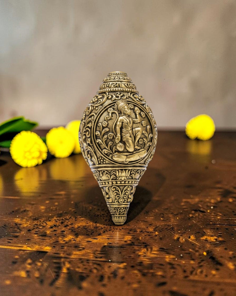 Rigvedaa brass shankh with Lord Hanuman engraving, ideal for pooja and home mandir decoration.
