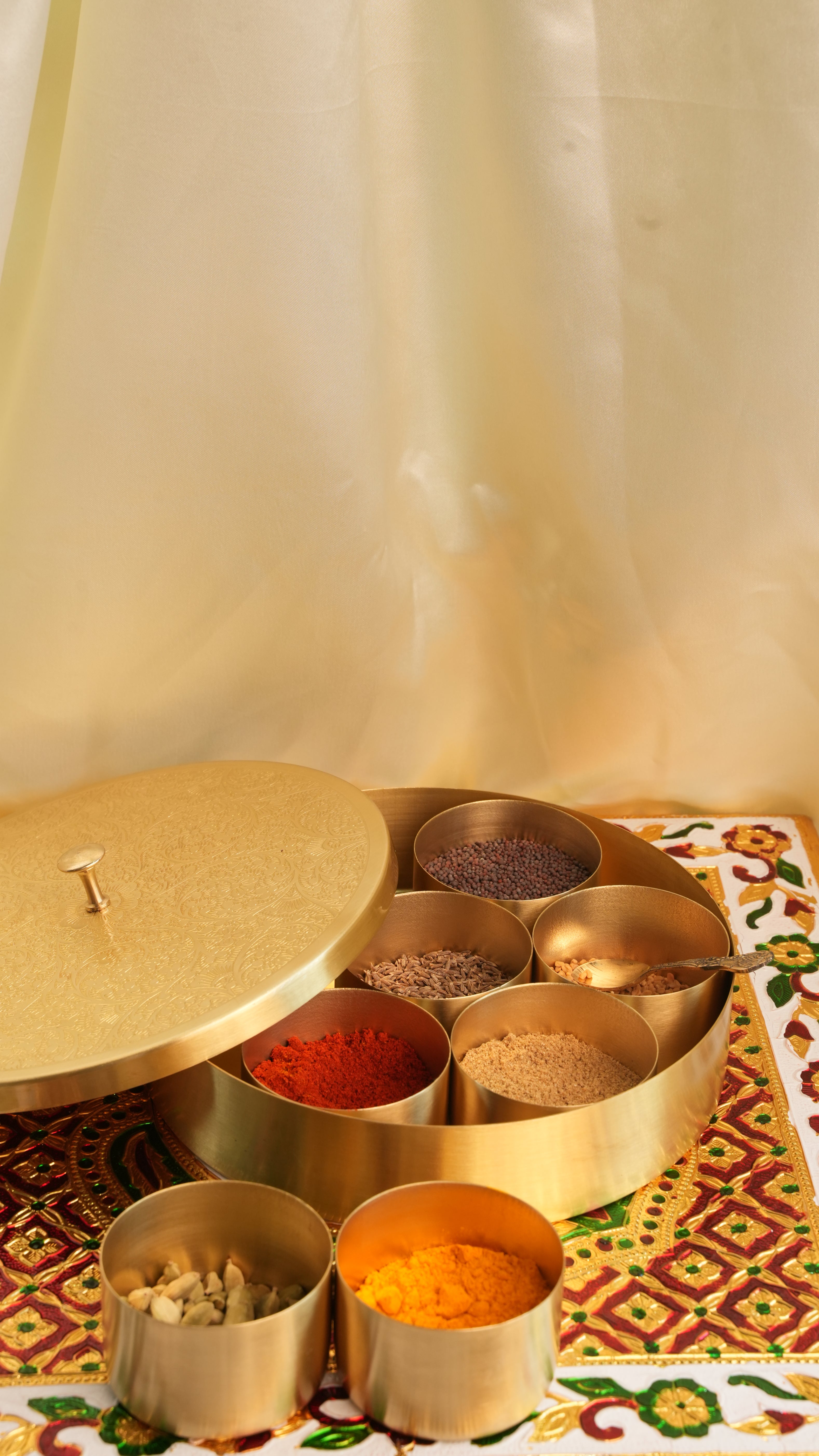 Premium Handcrafted Brass Masala Box – 7 Compartment Spice Organizer with Spoon