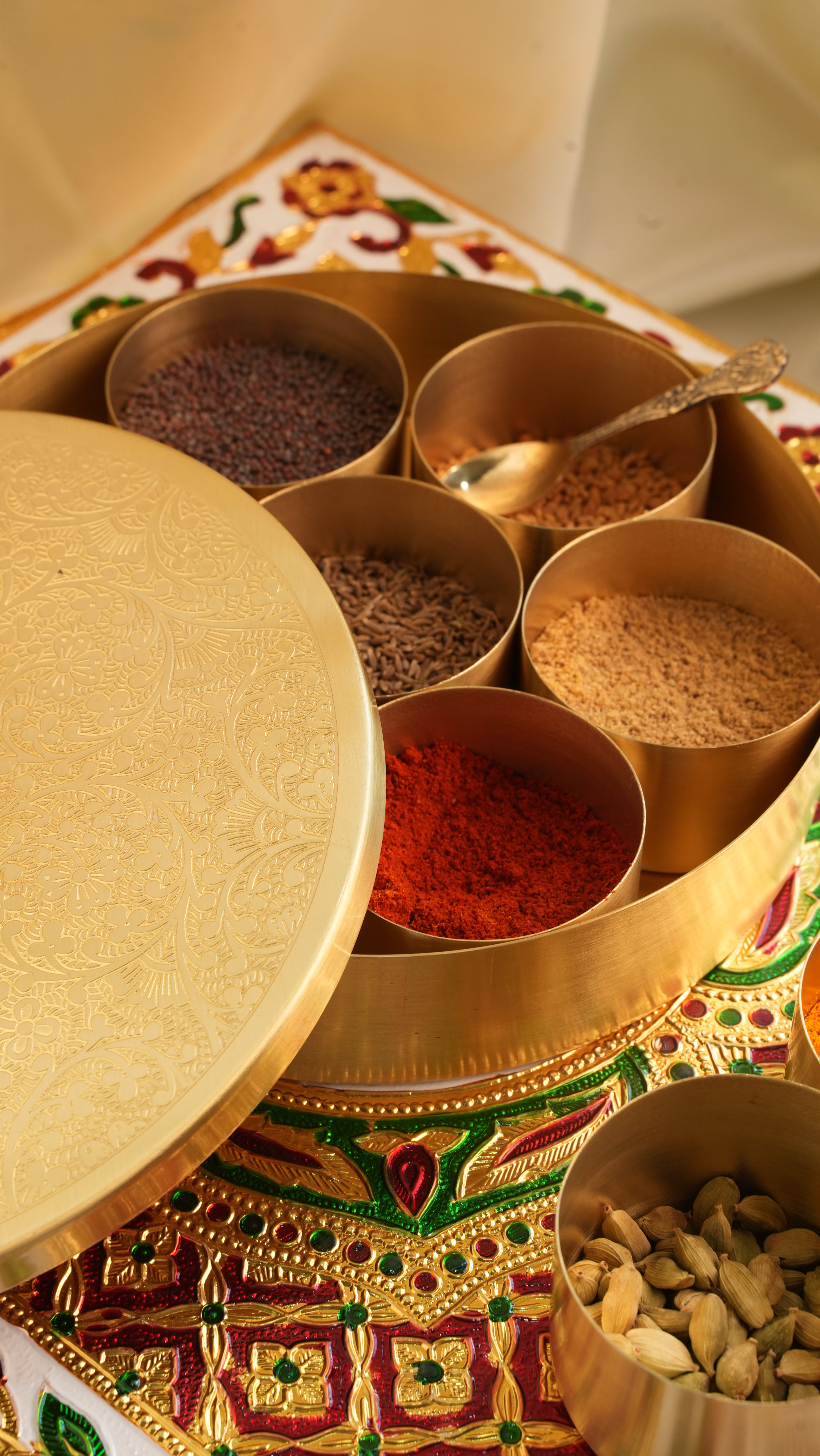 Premium Handcrafted Brass Masala Box – 7 Compartment Spice Organizer with Spoon