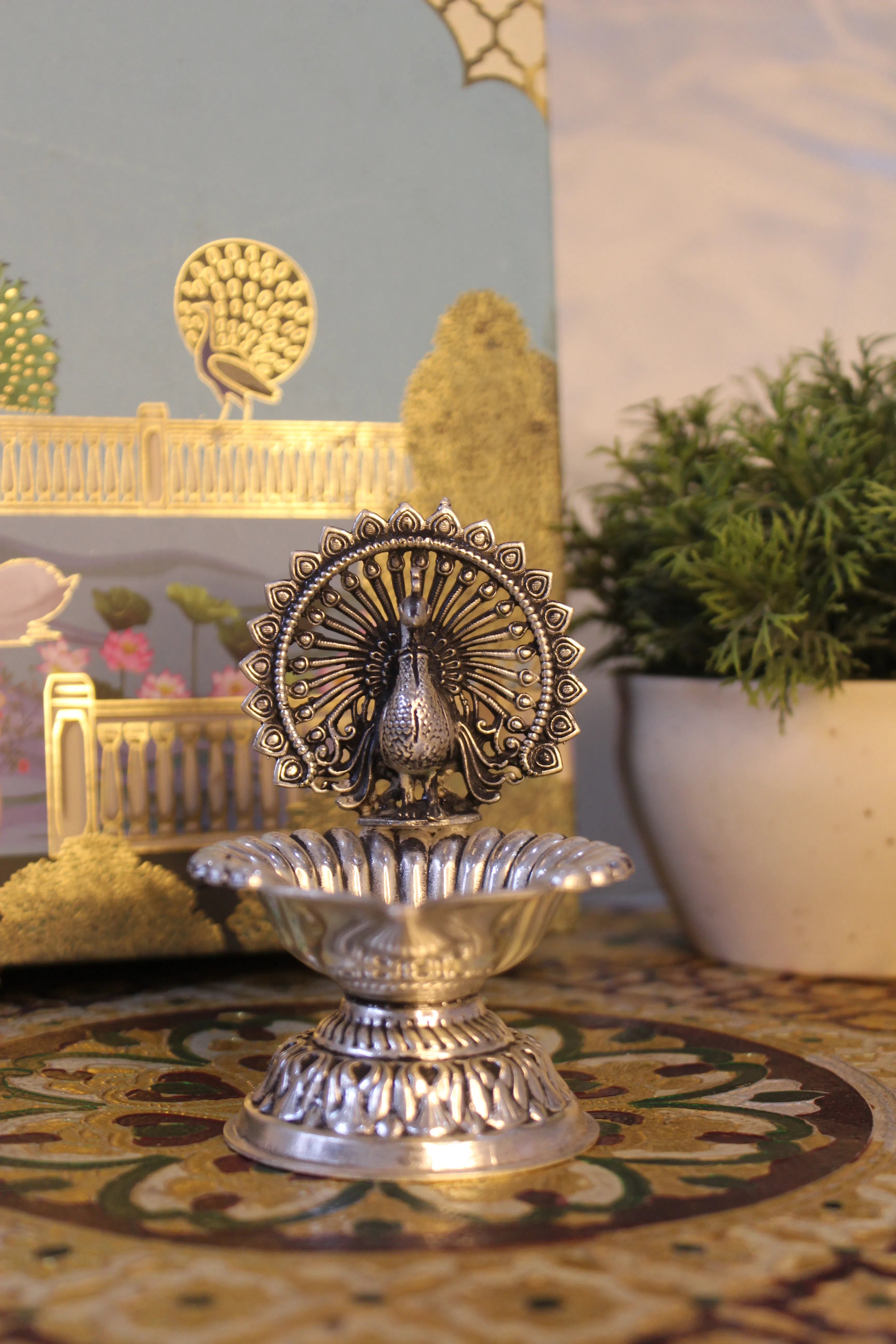 999 Silver-Polish Brass Peacock Diya | Decorative Pooja Oil Lamp
