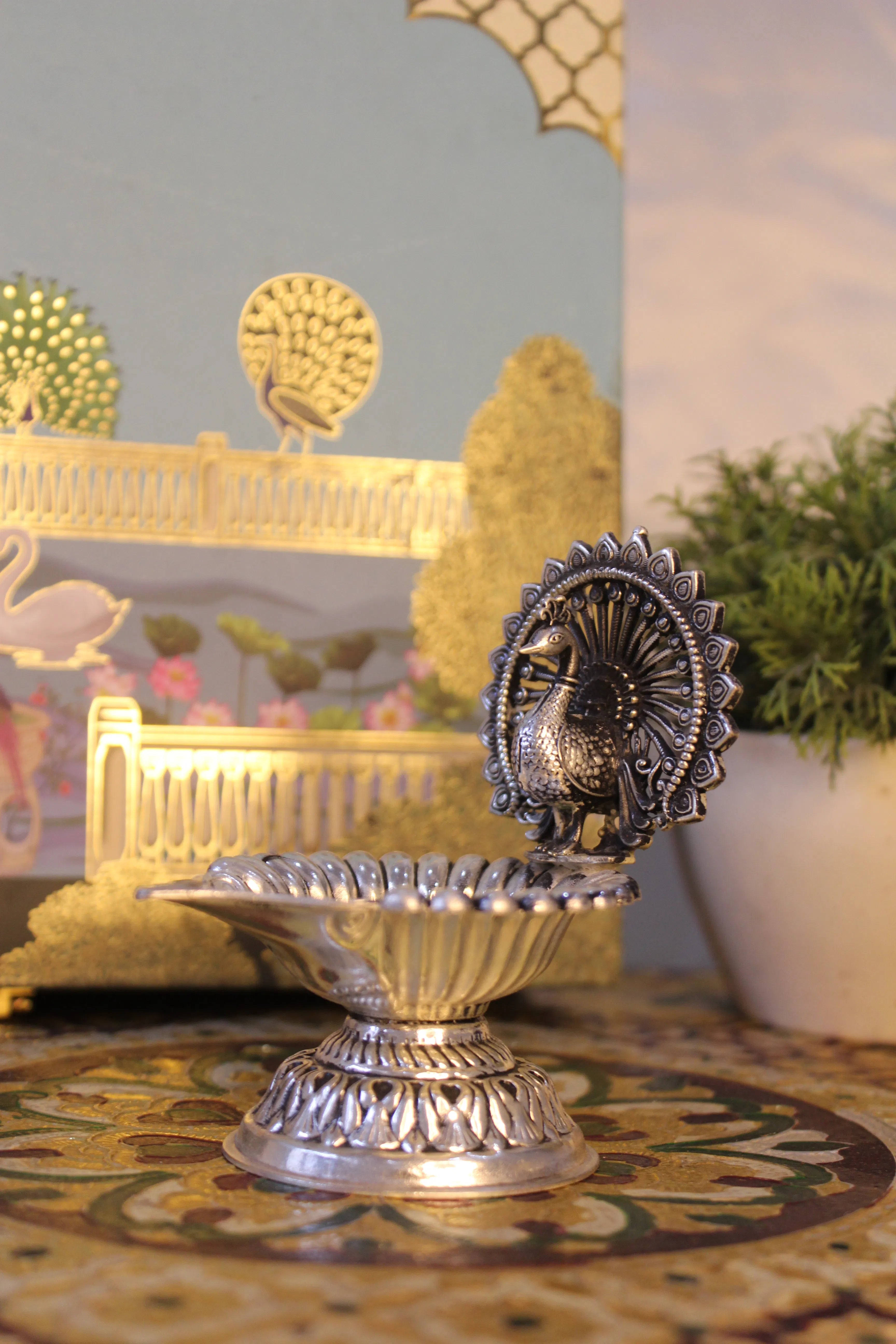 999 Silver-Polish Brass Peacock Diya | Decorative Pooja Oil Lamp
