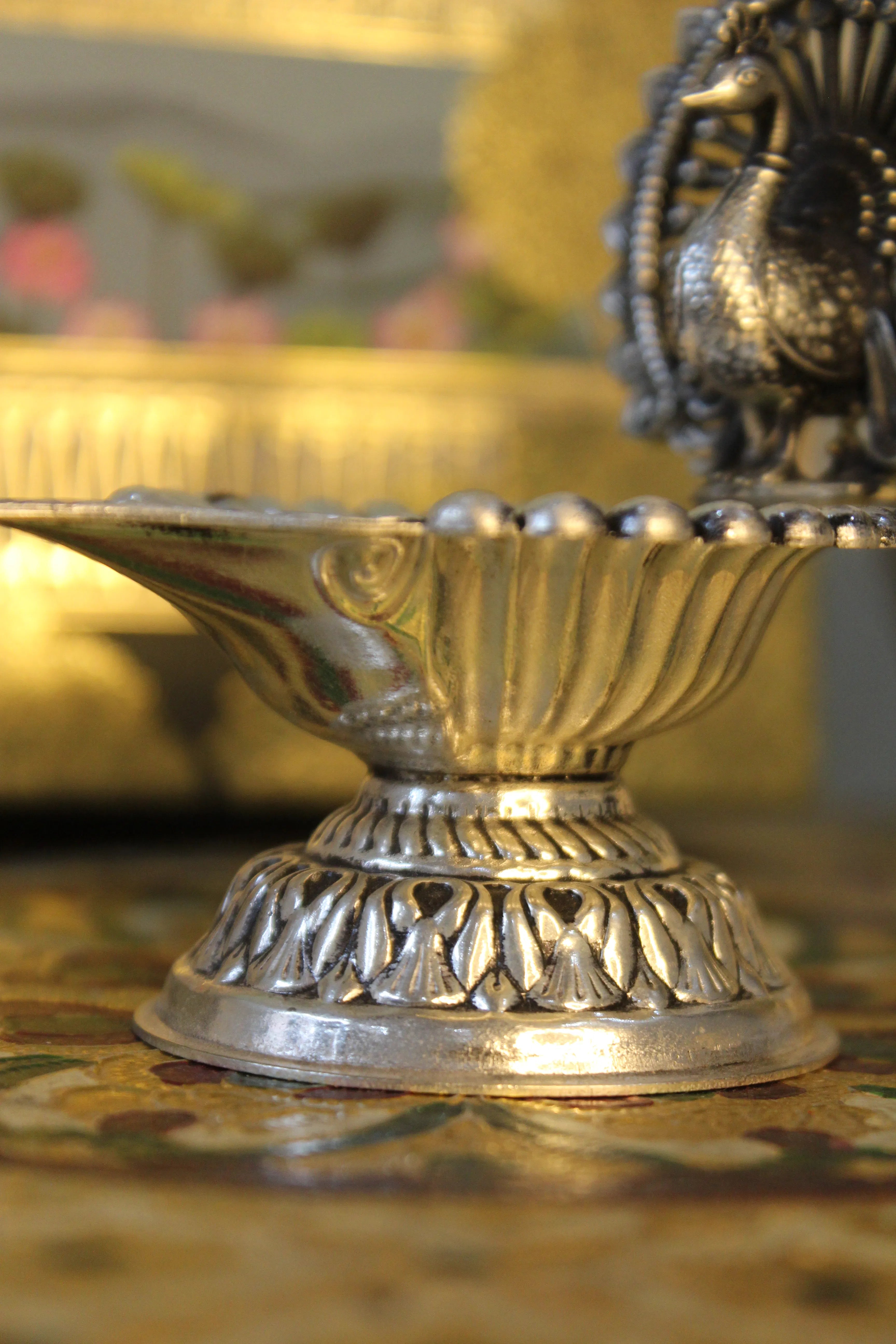 999 Silver-Polish Brass Peacock Diya | Decorative Pooja Oil Lamp