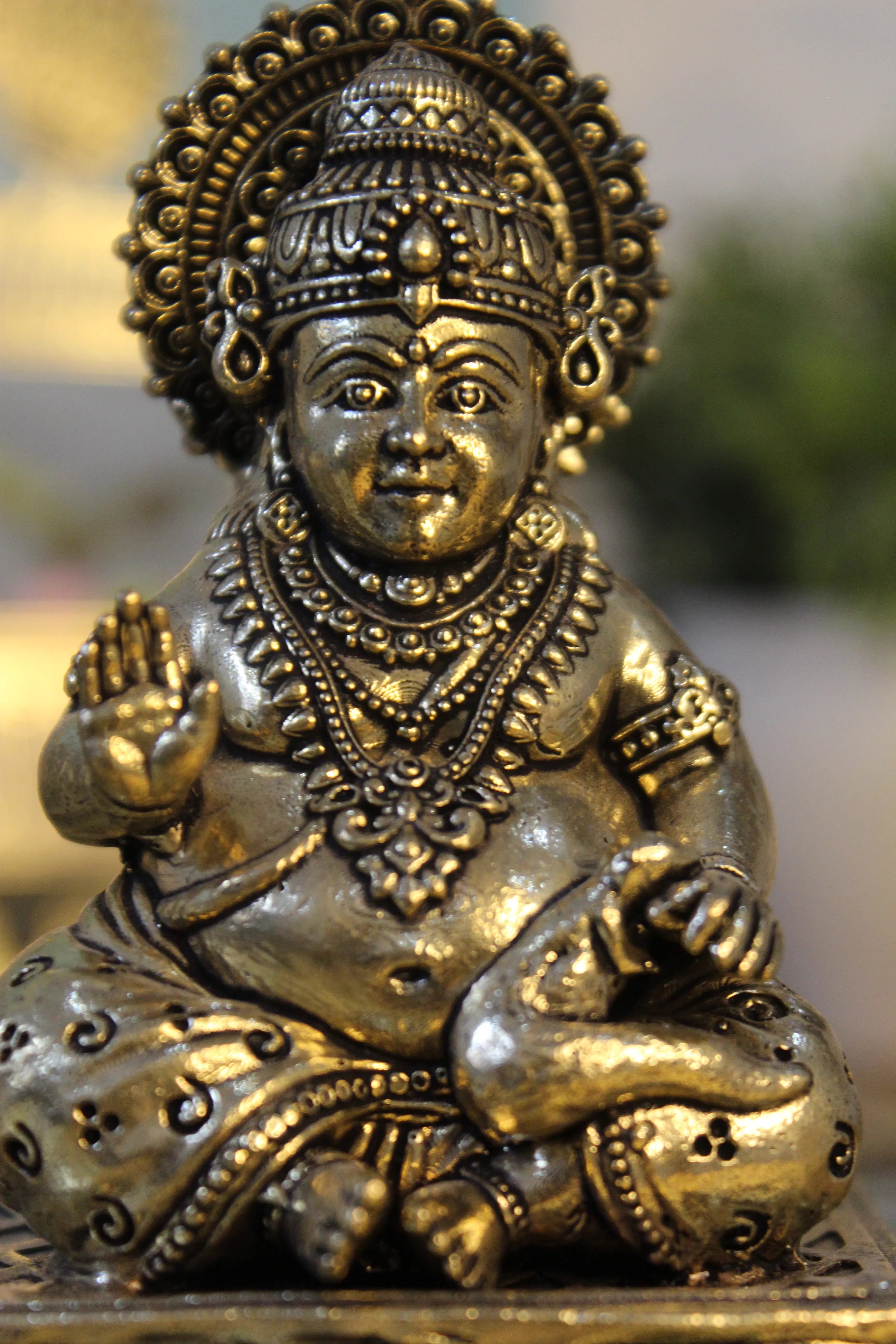 Handcrafted Brass Kubera Sitting on Decorative Base