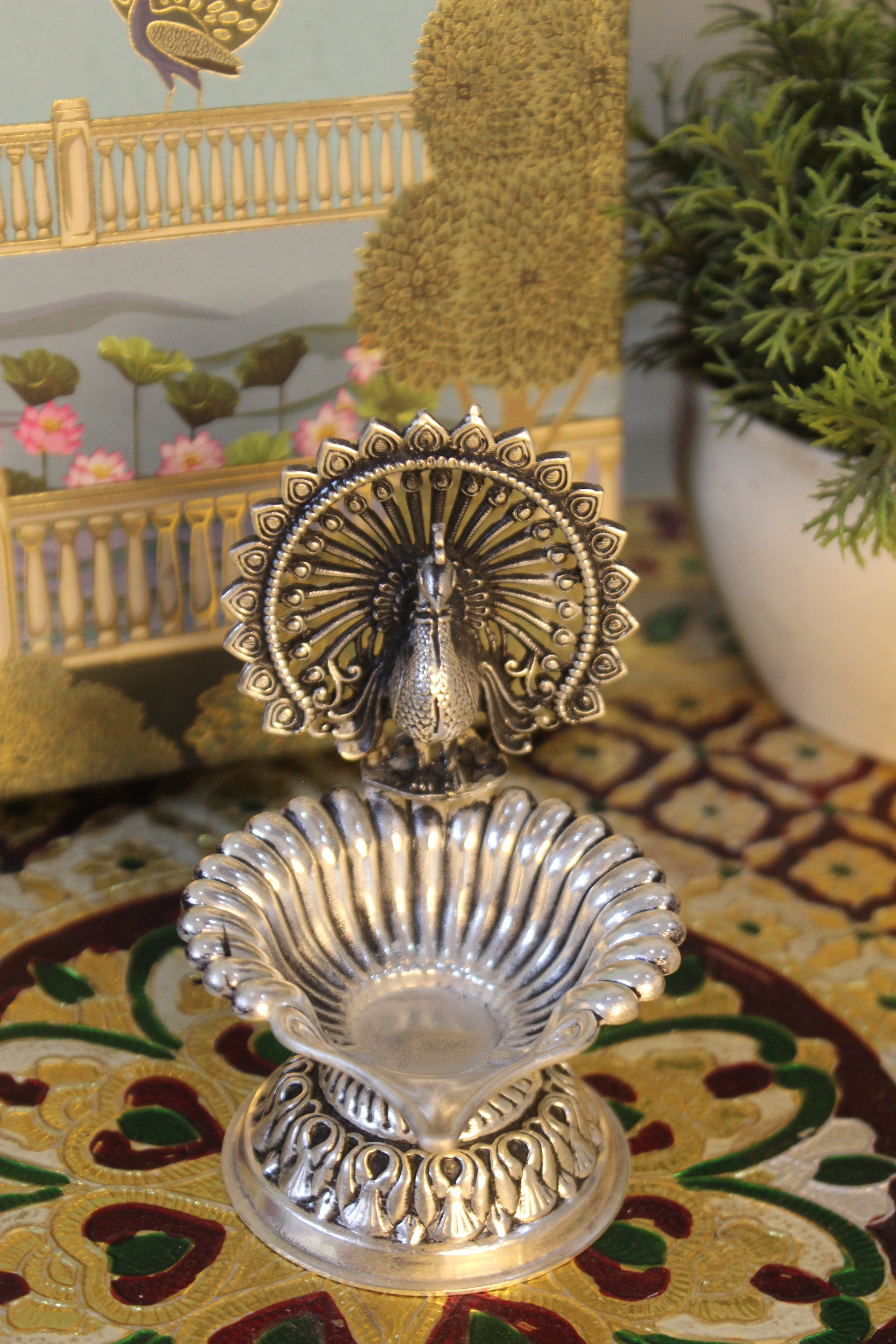 999 Silver-Polish Brass Peacock Diya | Decorative Pooja Oil Lamp