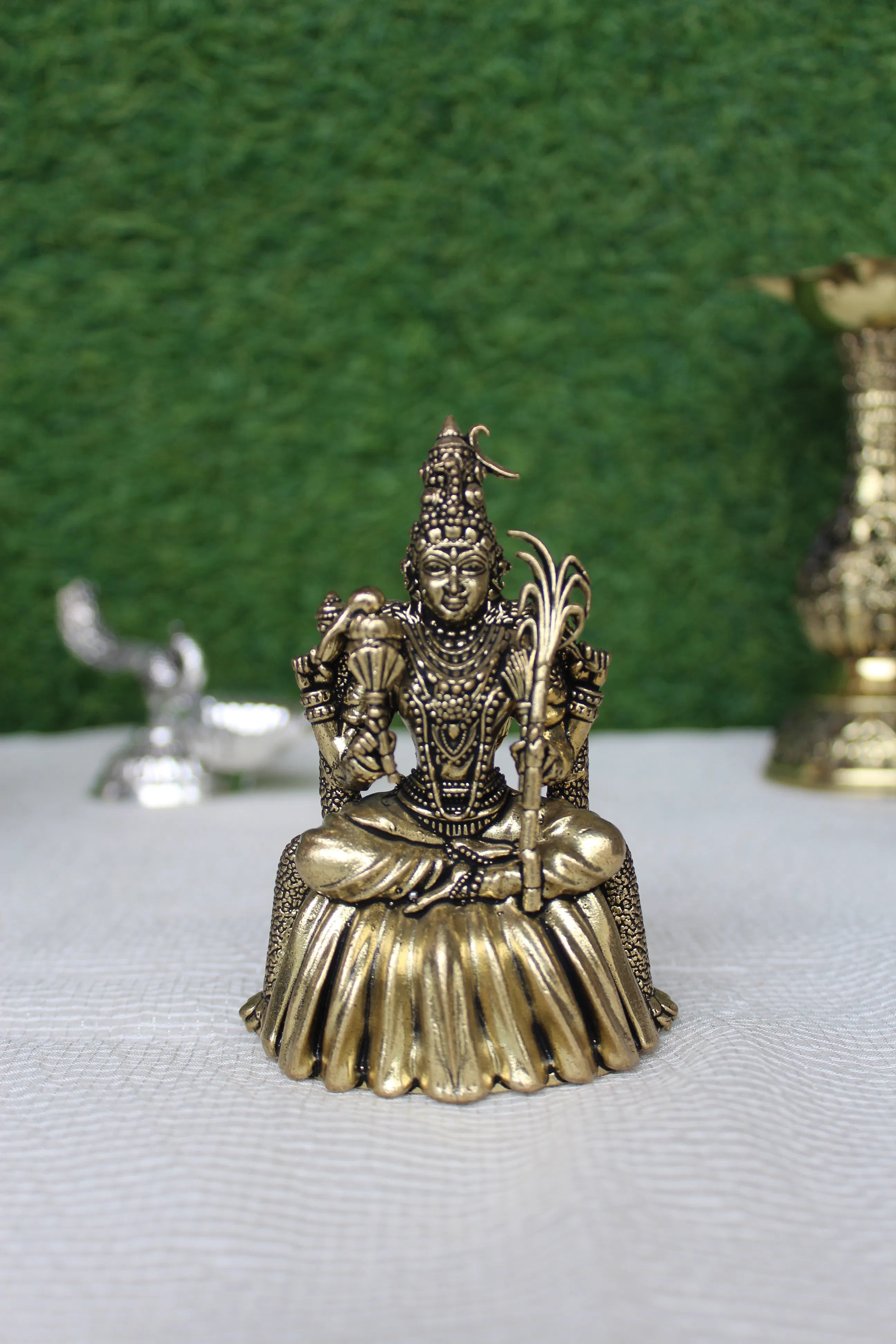 Kamakshi Mata brass murti full front view – handcrafted brass idol of Goddess Kamakshi seated , buy online at Rigvedaa