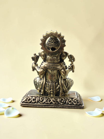 Rigvedaa™ antique gold finish Lord Ganesha idol figurine showing intricate back detailing on a neutral background