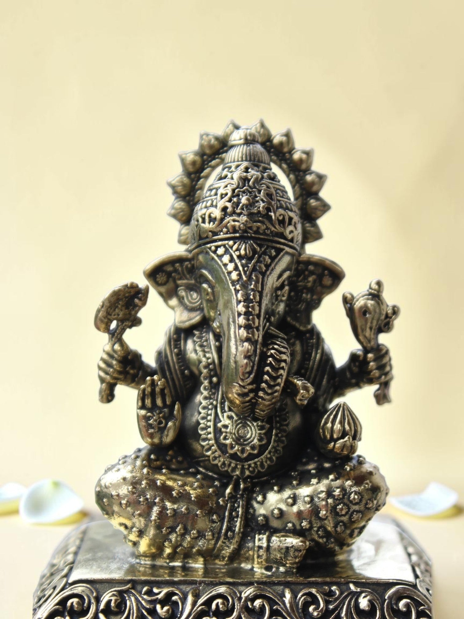 Rigvedaa™ antique gold Lord Ganesha idol with intricate engravings, perfect for home decor and meditation spaces.
