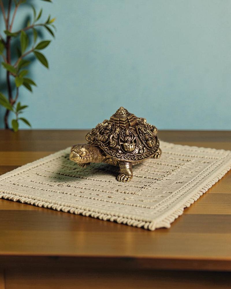 Rigvedaa brass Ashta Lakshmi tortoise with Shree Yantra, intricate carvings, golden patina, Vastu Feng Shui decor.
