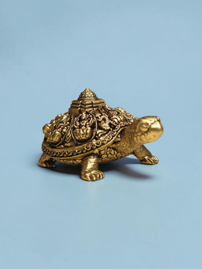 Rigvedaa™ brass Ashta Lakshmi tortoise figurine with intricate Shree Yantra shell engravings and golden patina finish.