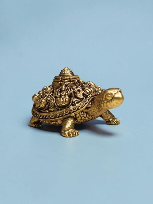 Rigvedaa™ brass Ashta Lakshmi tortoise figurine with intricate Shree Yantra shell engravings and golden patina finish.