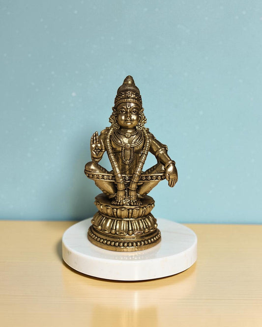 Rigvedaa™ Brass Lord Ayyappan statue in yogic posture on lotus base, antique gold finish, 4.75 inches.