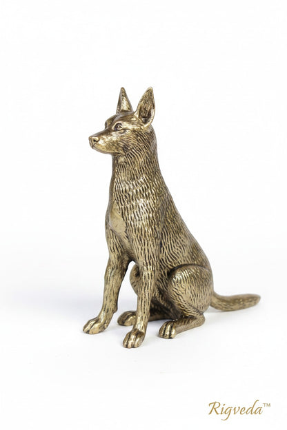 Rigvedaa™ brass dog idol, sitting alert with golden finish. Symbolizes loyalty and protection.