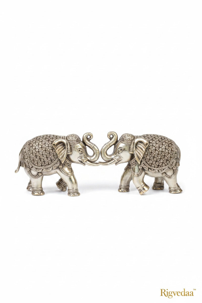 Rigvedaa™ pair of antique gold brass elephants with intricate detailing, Vastu & Feng Shui decor.