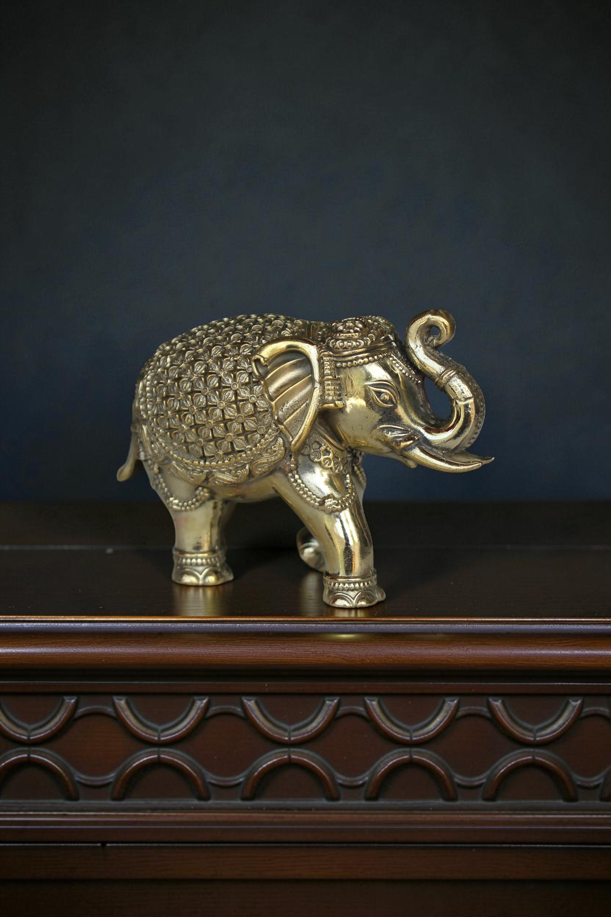 Rigvedaa™ handcrafted brass elephant showpiece with intricate detailing, antique gold finish, Vastu & Feng Shui decor.