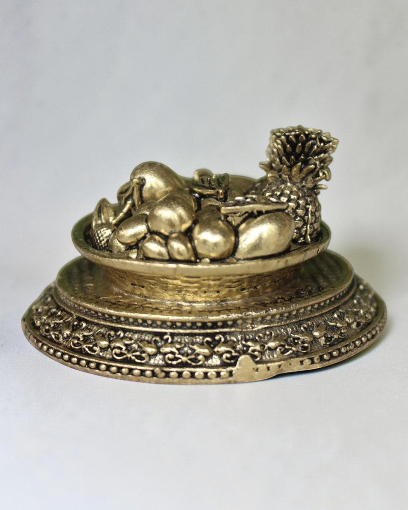 Rigvedaa™ antique gold brass miniature fruit basket idol with ornate pedestal base, symbol of prosperity and abundance.