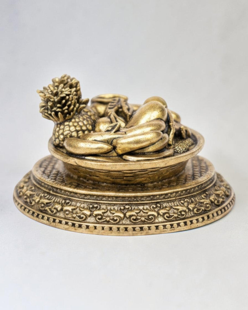 Rigvedaa™ antique gold brass miniature fruit basket idol with ornate pedestal, symbolizing prosperity and abundance.