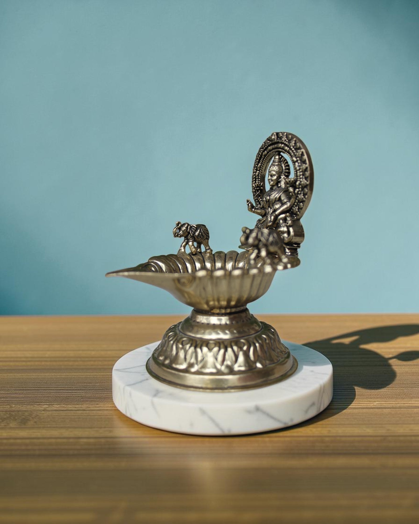 Rigvedaa™ handcrafted brass Gaj Laxmi diya oil lamp with elephant motif, 4.5 inch, antique finish for puja and home decor.