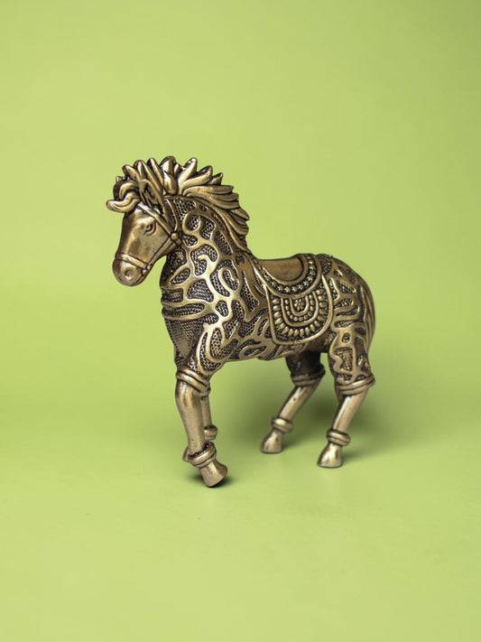 Rigvedaa™ decorative brass galloping horse statue with intricate traditional relief work and a warm golden patina.