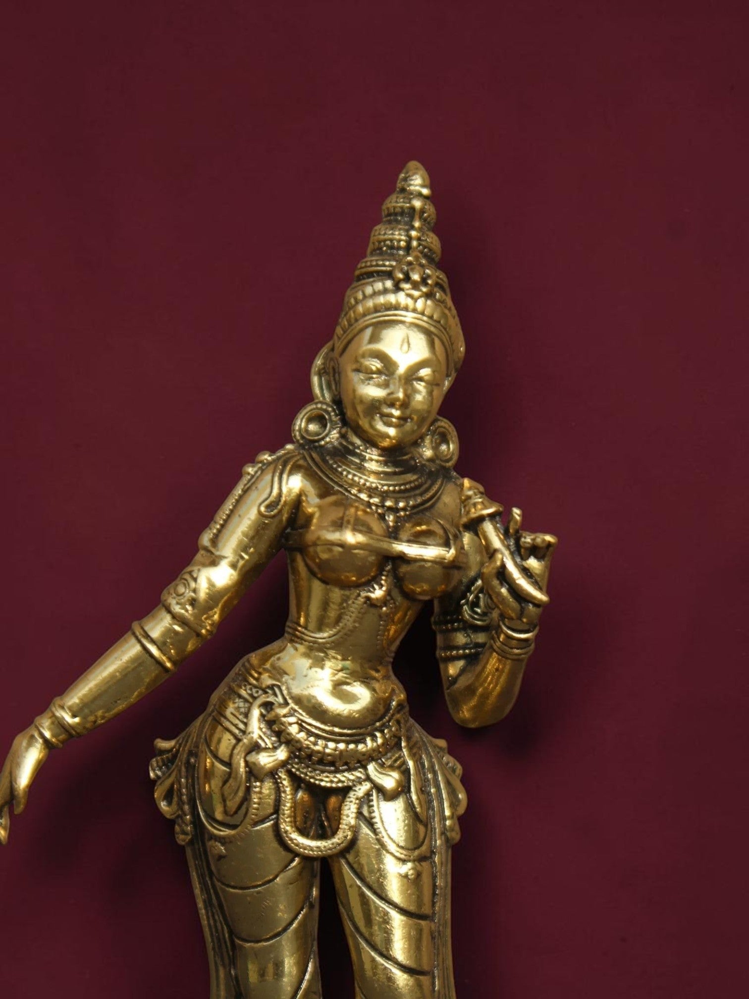 Rigvedaa™ brass Goddess Parvati idol featuring intricate traditional jewelry and a polished golden finish.