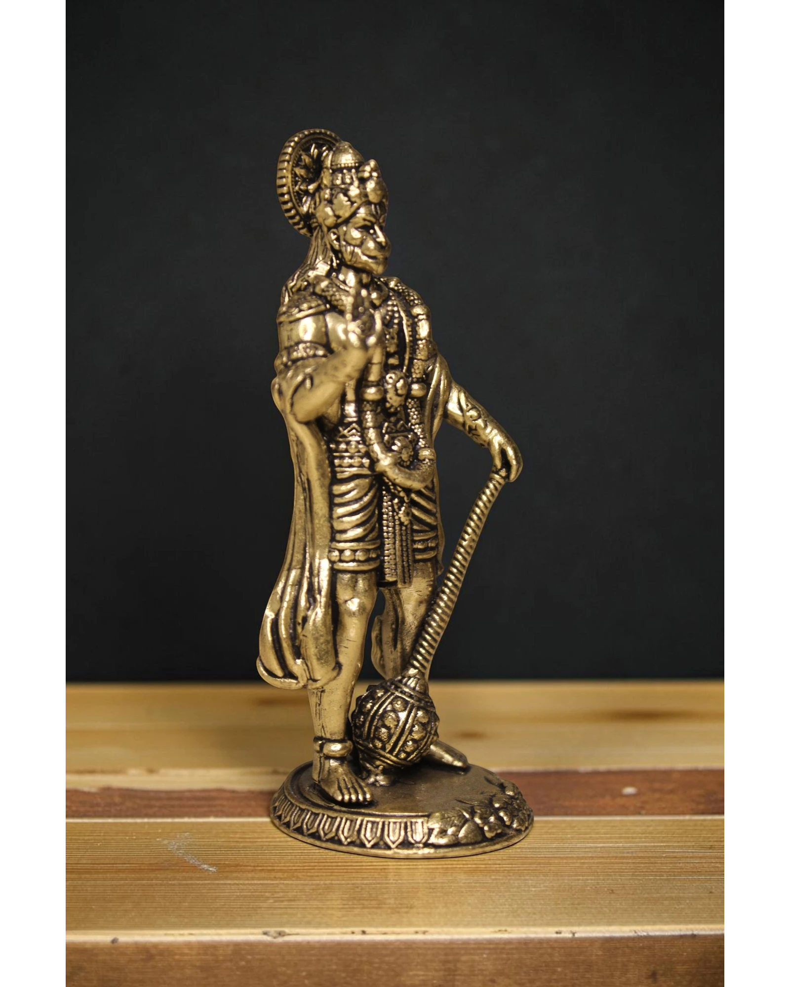 Rigvedaa™ brass Hanuman idol in Ashirwad pose, holding a mace. Golden finish, intricate detailing.