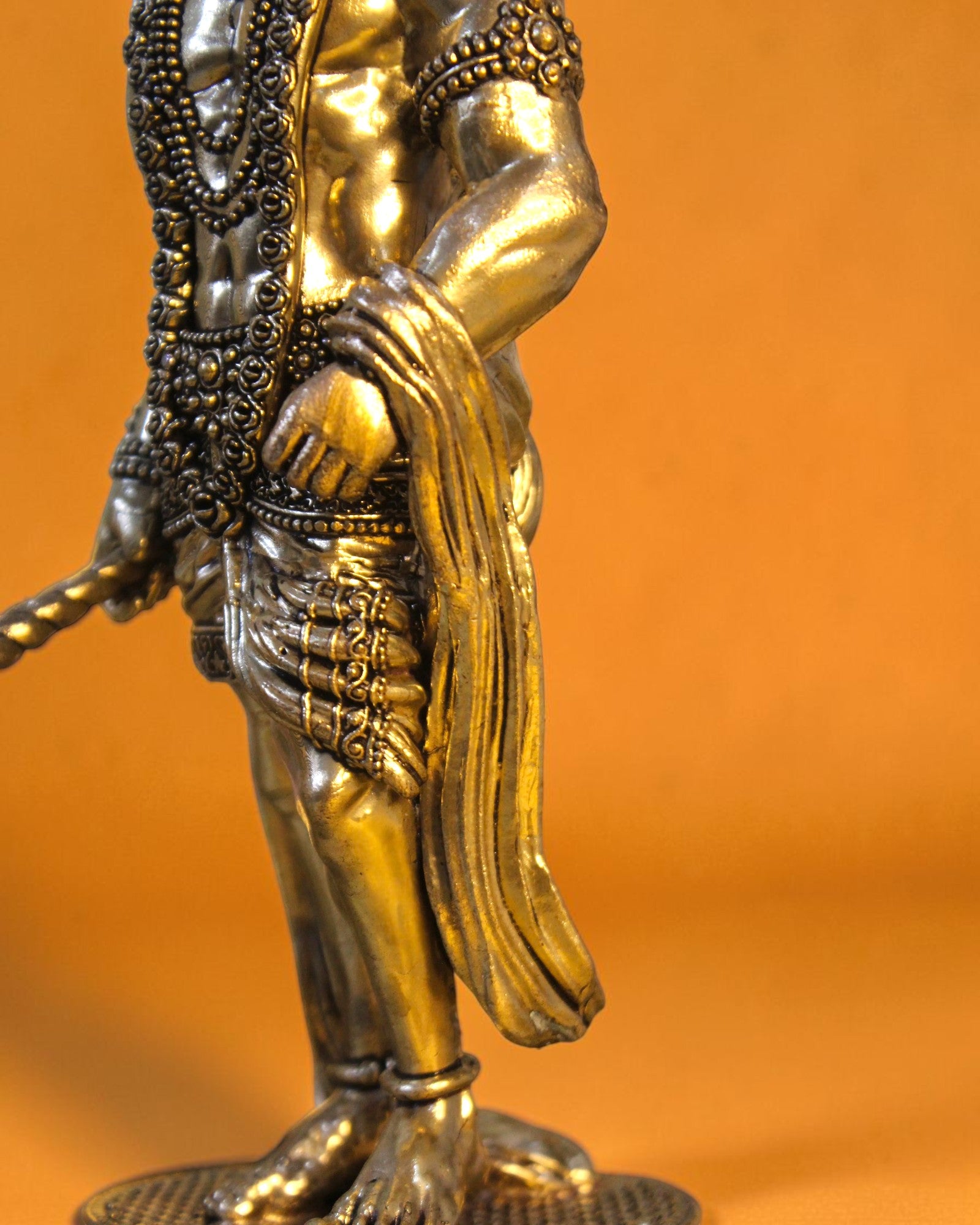 Rigvedaa brass standing Hanuman idol with Gada, 10-inch, golden patina, detailed craftsmanship, devotional art