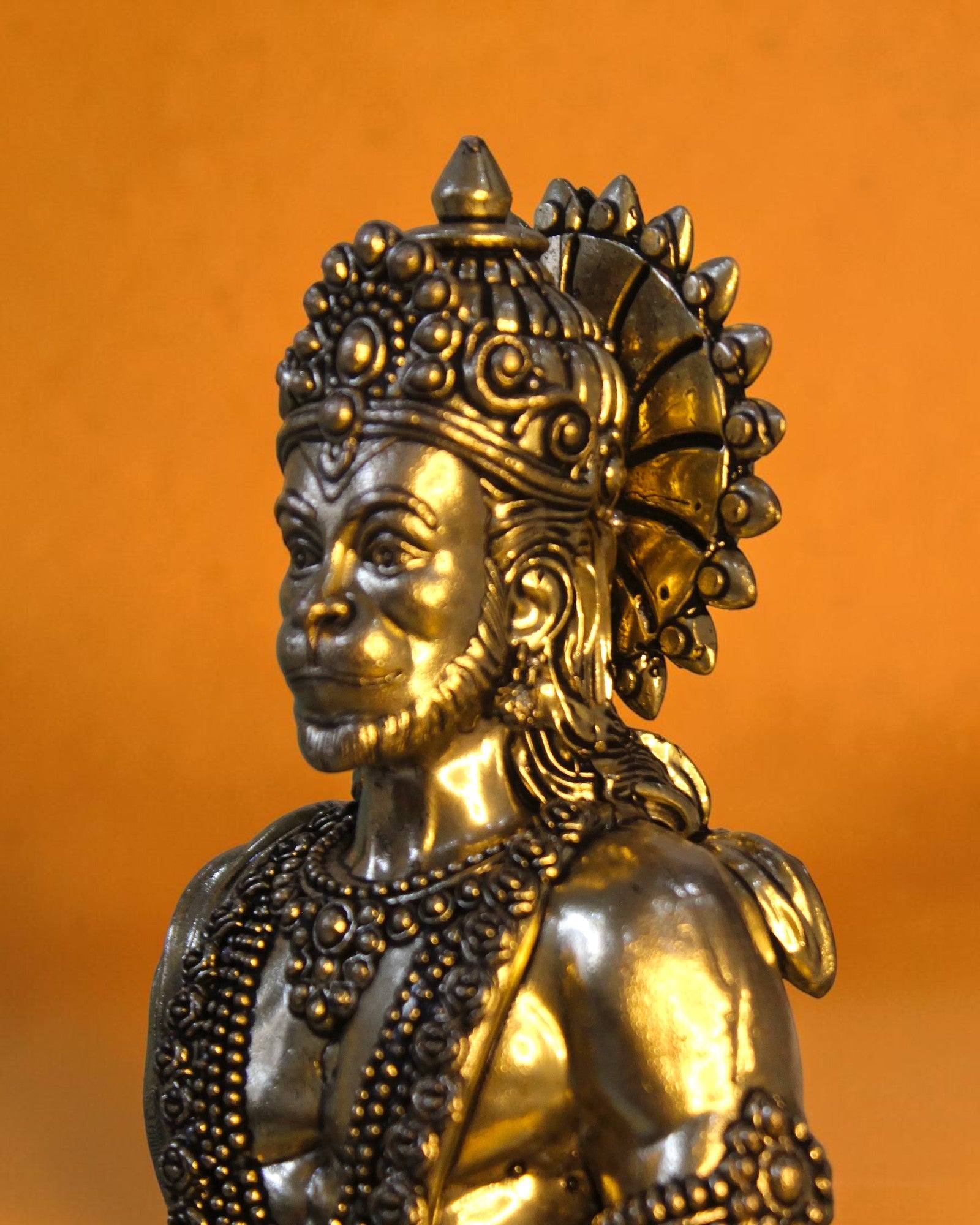 Rigvedaa brass standing Hanuman idol with Gada, 10-inch, golden patina, detailed crown and jewelry.