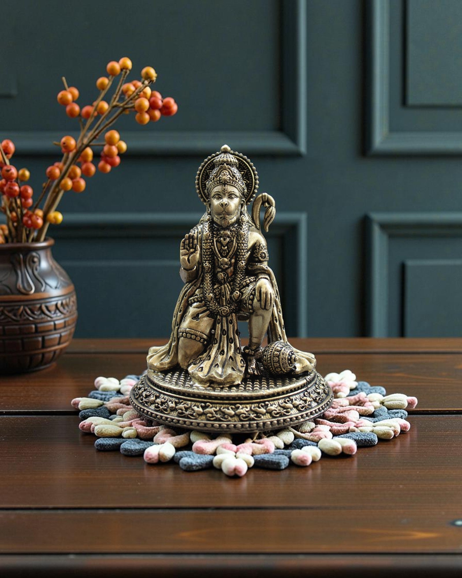 Rigvedaa™ brass Hanuman Ji statue in blessing pose, seated with mace, intricate details, golden patina.