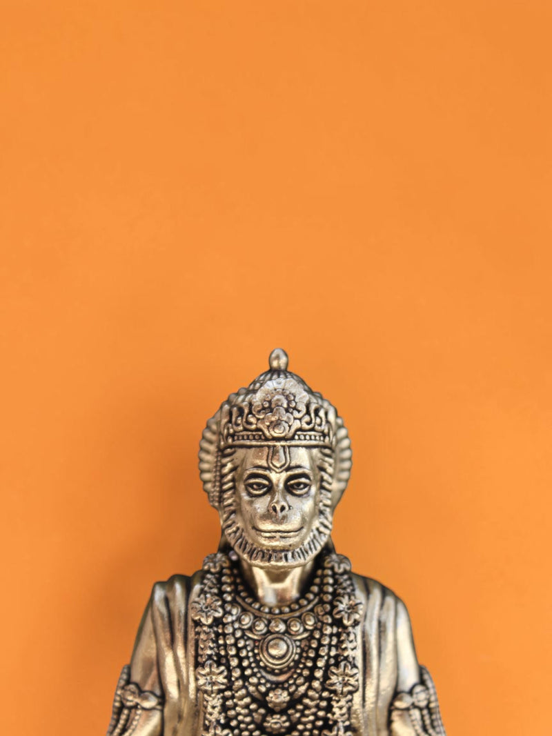 Rigvedaa™ brass Lord Hanuman statue in a serene meditative posture with intricate crown and mala detailing