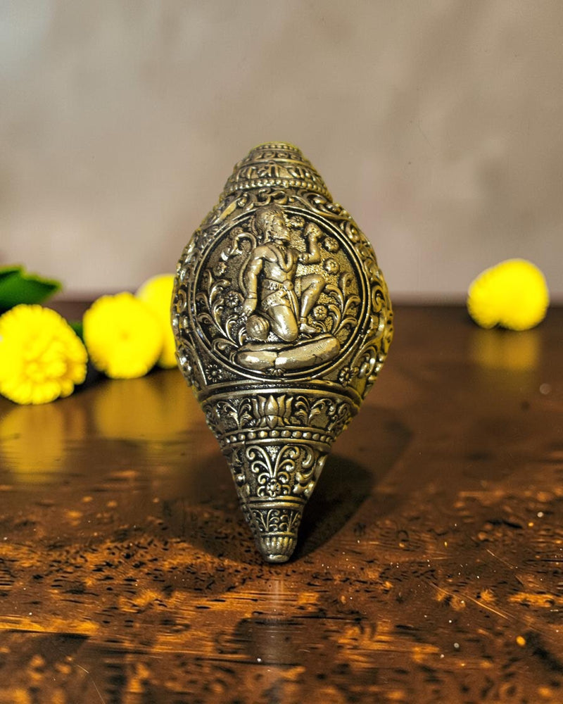 Rigvedaa™ brass shankh with Lord Hanuman engraving, ideal for pooja and home mandir decor.
