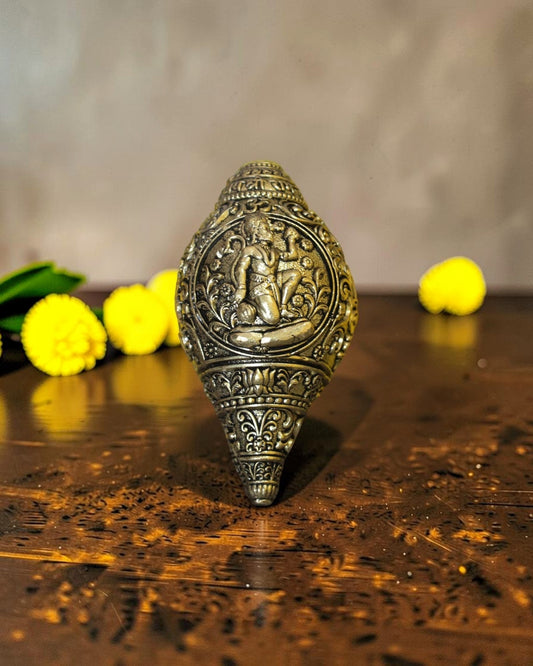Rigvedaa™ brass shankh with Lord Hanuman engraving, ideal for pooja and home mandir decor.