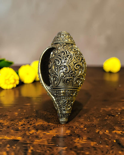 Rigvedaa™ brass shankh with intricate Lord Hanuman engraving, ideal for pooja and home mandir.
