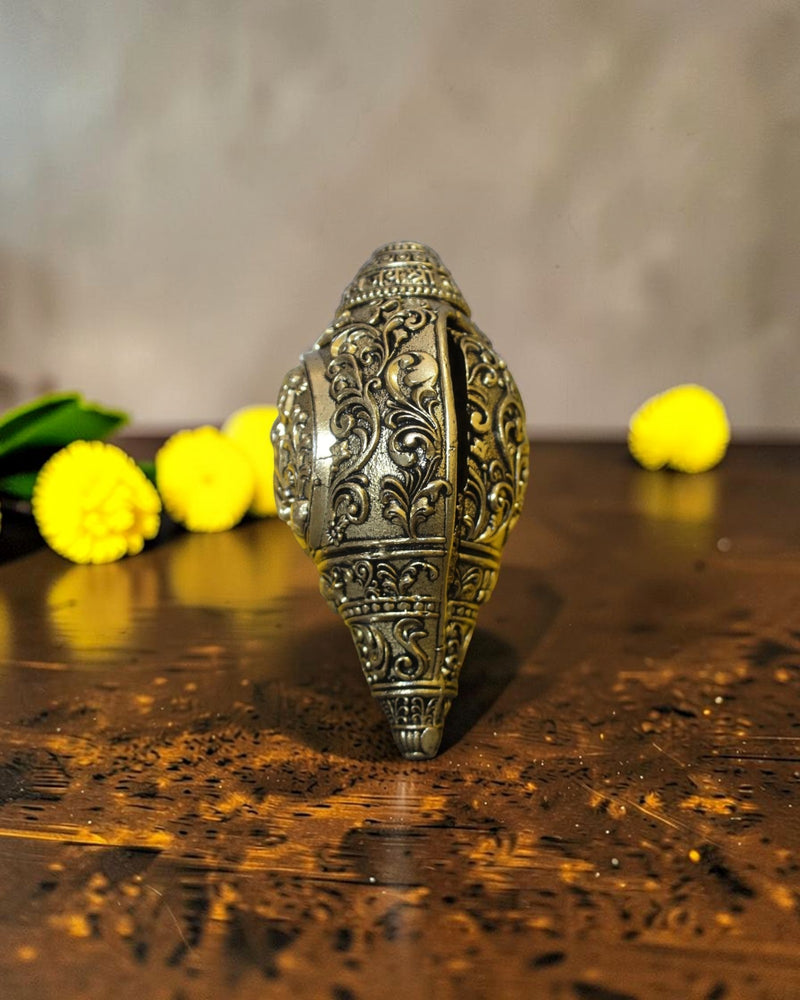 Rigvedaa™ brass shankh with intricate Lord Hanuman engraving, ideal for pooja and home mandir.