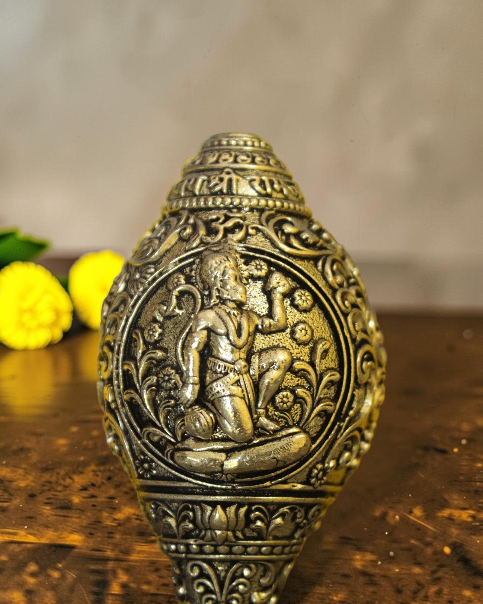 Rigvedaa™ brass shankh with Lord Hanuman engraving, ideal for pooja and home mandir.