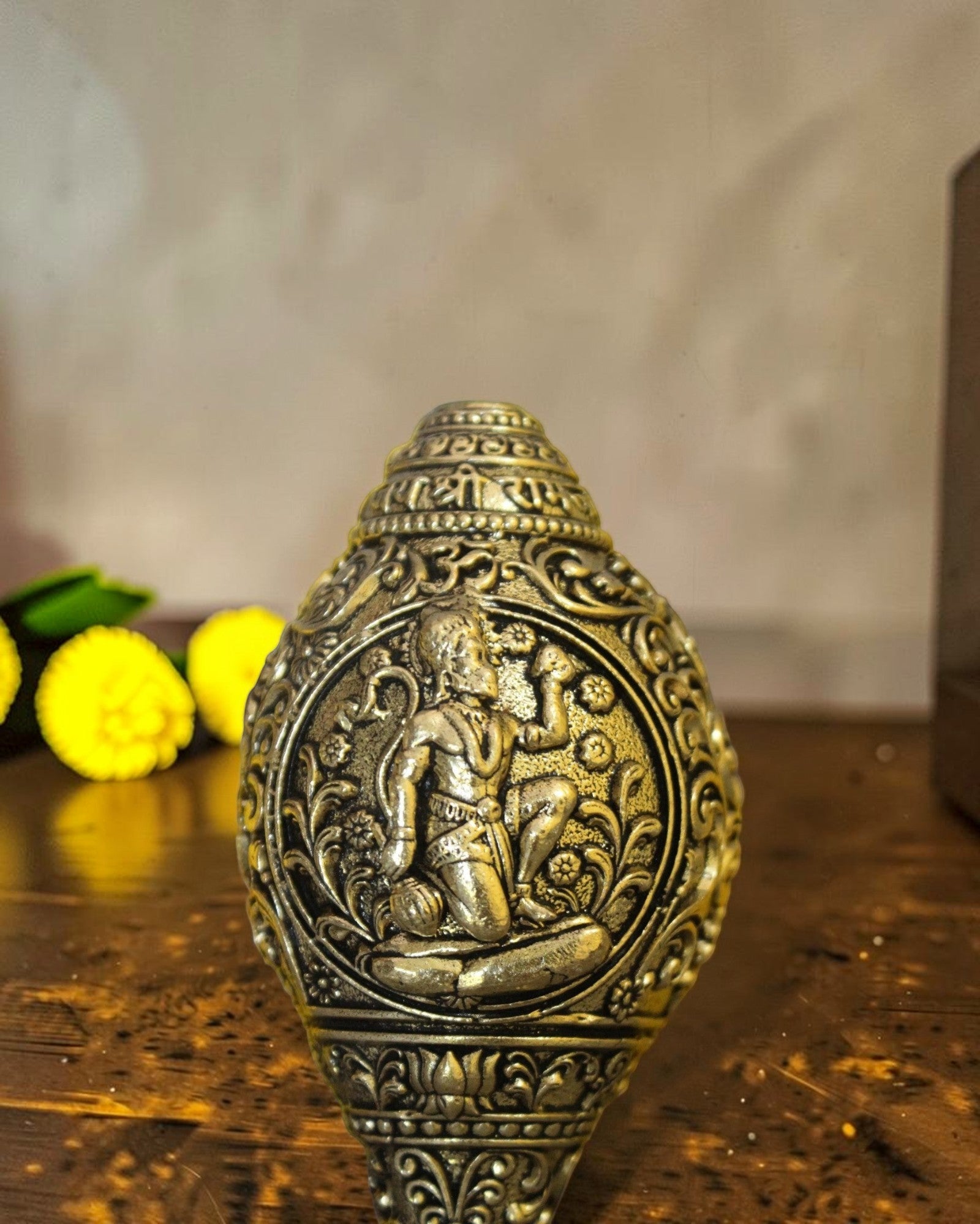 Rigvedaa™ brass shankh with Lord Hanuman engraving, ideal for pooja and home mandir.