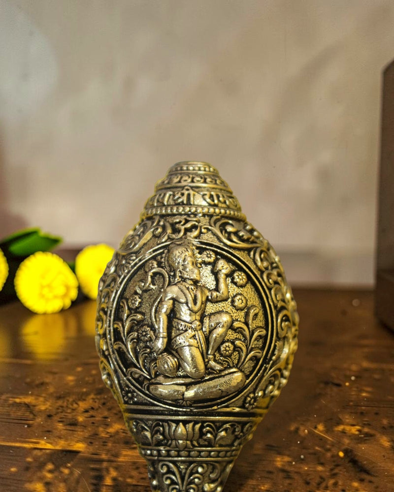 Rigvedaa™ brass shankh with Lord Hanuman engraving, ideal for pooja and home mandir.