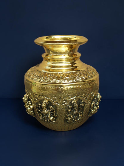 Rigvedaa™ handcrafted brass kalash pot with polished gold finish and intricate embossed deity carvings
