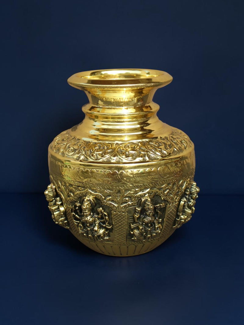 Rigvedaa™ handcrafted brass kalash pot with polished gold finish and intricate embossed deity carvings