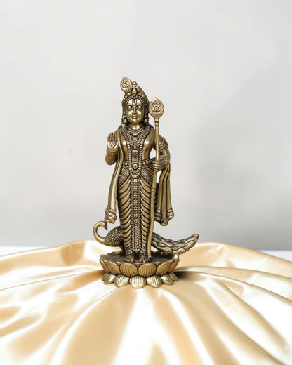 Rigvedaa brass Lord Kartikeya idol with spear and peacock, for pooja room and home decor.
