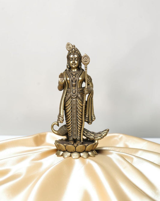 Rigvedaa brass Lord Kartikeya idol with spear and peacock, for pooja room and home decor.