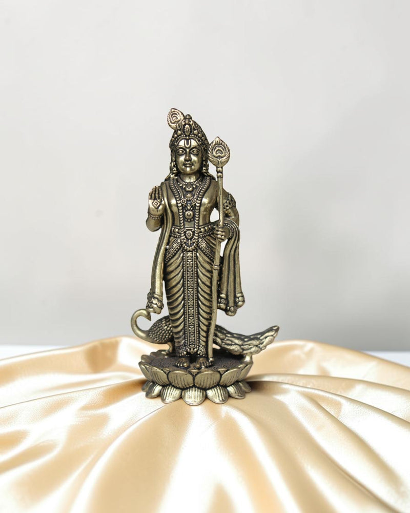 Rigvedaa brass Lord Kartikeya idol with spear and peacock, for pooja room and home decor.