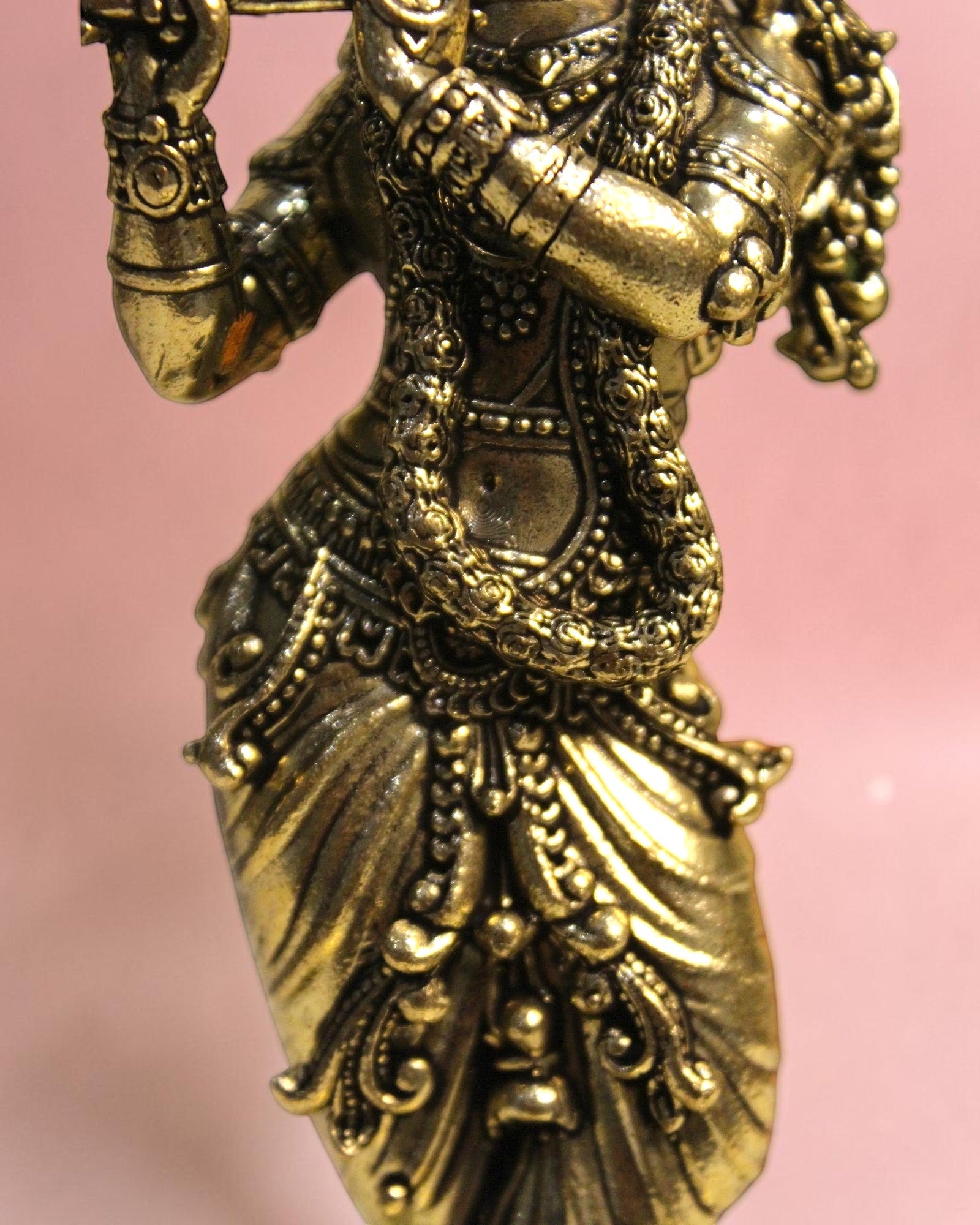 Rigvedaa

Handcrafted brass statue of Lord Krishna playing the flute, detailed traditional attire and ornaments.