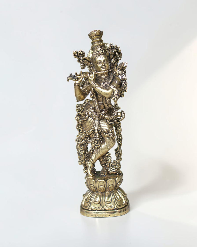Rigvedaa™ brass Krishna idol playing flute, 7.5 inch, golden finish, intricate details, peacock crown, Tribhanga pose.