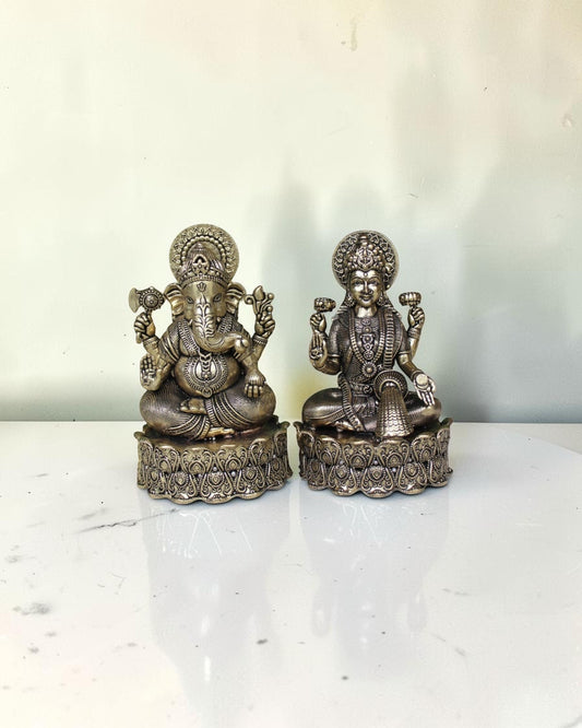 Rigvedaa brass Lakshmi Ganesh idol on lotus base, intricate detailing, golden finish. Goddess of wealth and Lord of wisdom.