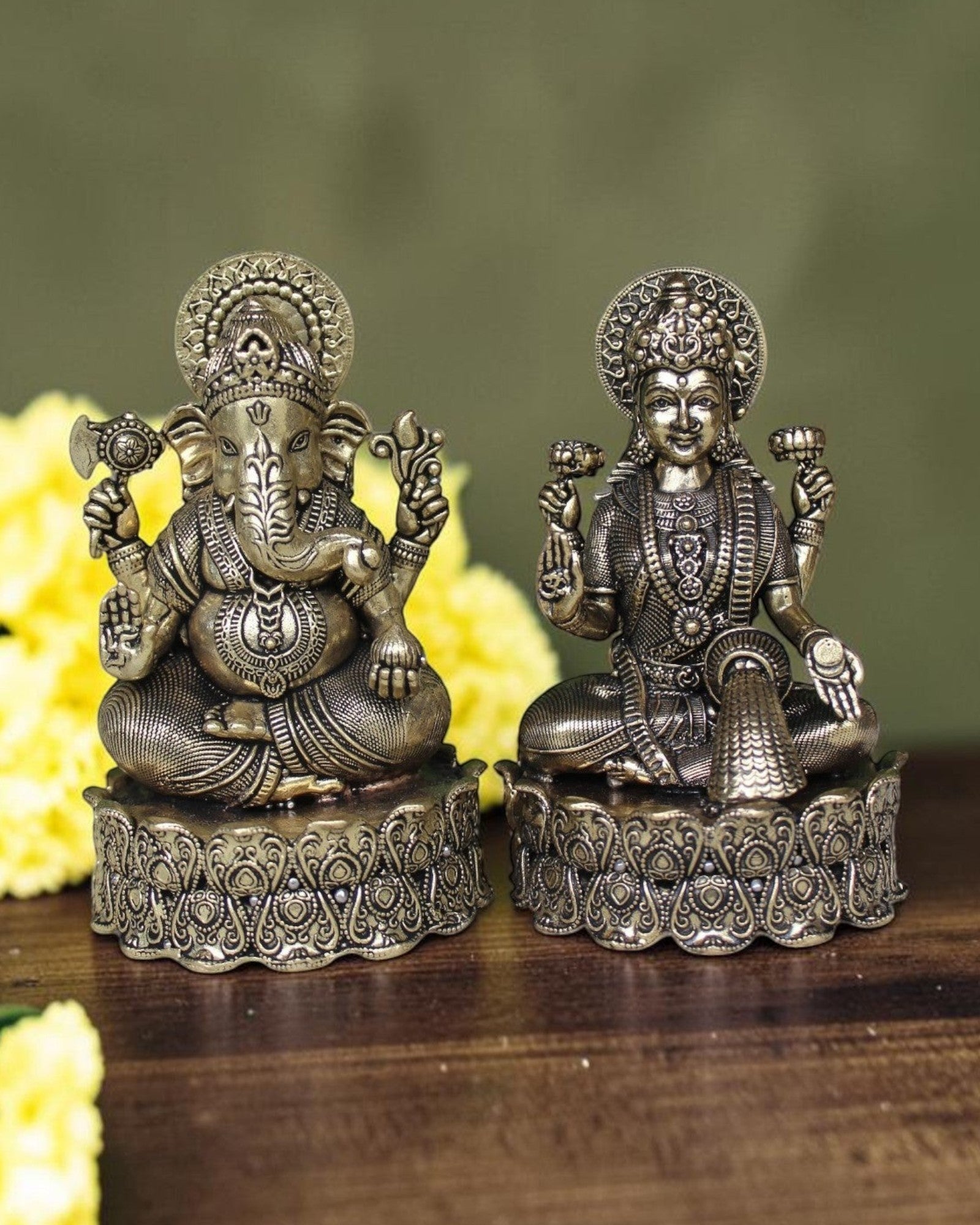 Rigvedaa brass Lakshmi Ganesh idol on lotus base, intricate detailing, golden finish. Goddess of wealth and Lord of wisdom.