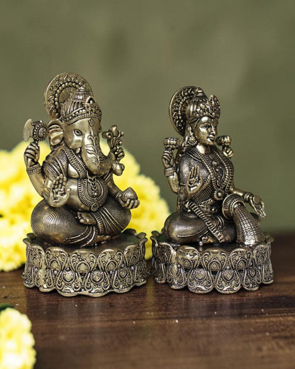 Rigvedaa™ brass Lakshmi Ganesh idol on lotus base, detailed antique gold finish, for wealth and wisdom.