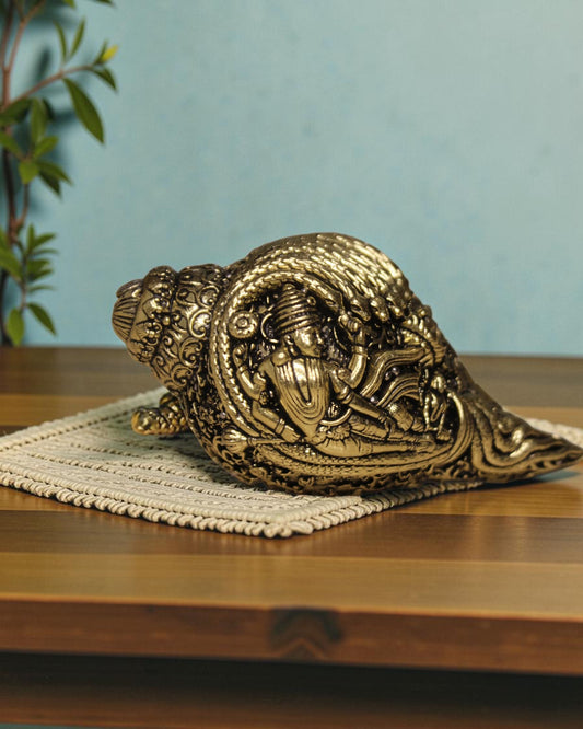 Rigvedaa™ Brass Lakshmi Narayan Vishnu Shankh with intricate engravings, ideal for pooja rooms and home temples.