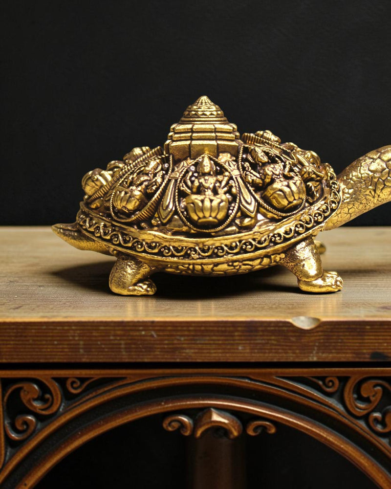 Rigvedaa™ golden brass tortoise figurine with Ashta Lakshmi and Shree Yantra engraving, Vastu Feng Shui item for prosperity.