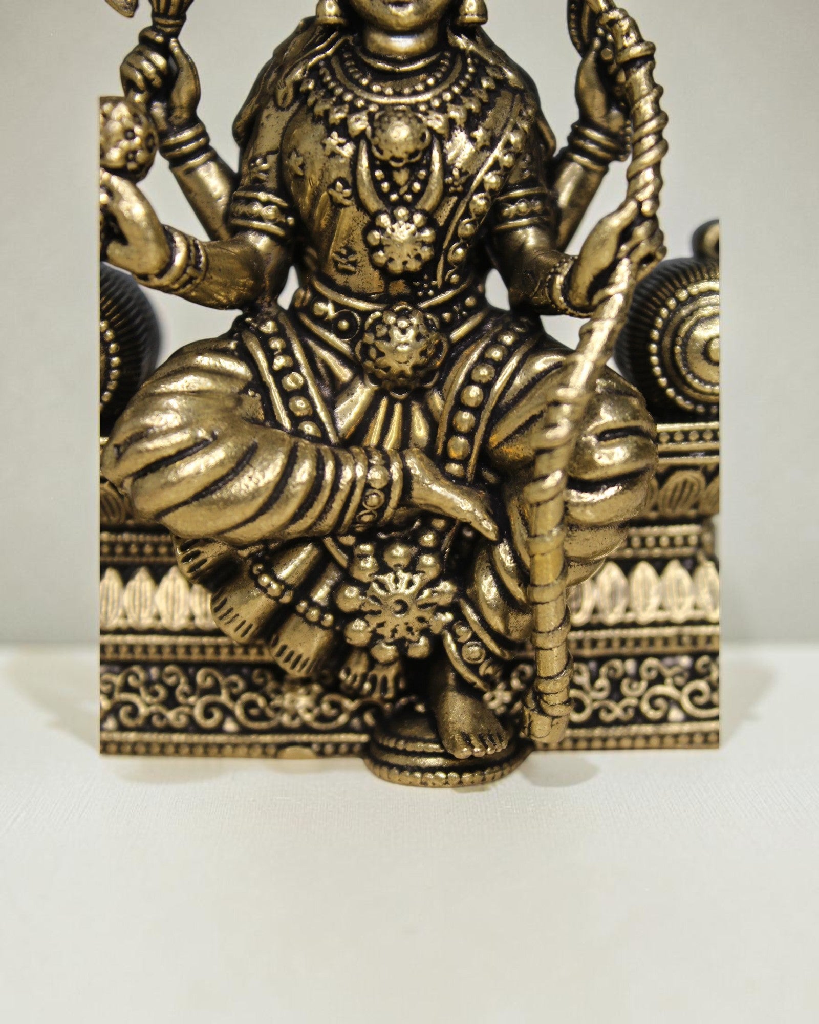 Rigvedaa™ Brass Lalitha Tripura Sundari Devi idol, 4-inch, golden patina, intricate traditional relief work, seated posture, divine ornaments, crown, compassionate expression.