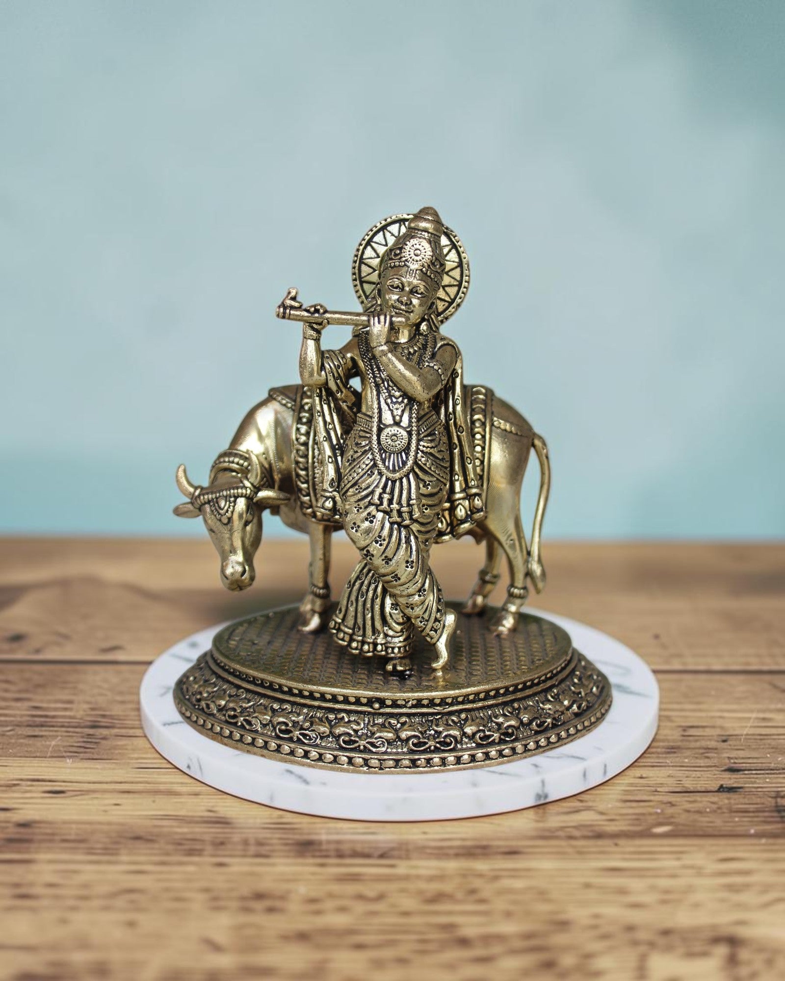 Rigvedaa™ Brass Lord Krishna playing flute with cow statue, 5 inch, golden patina, intricate details, Vastu compliant.