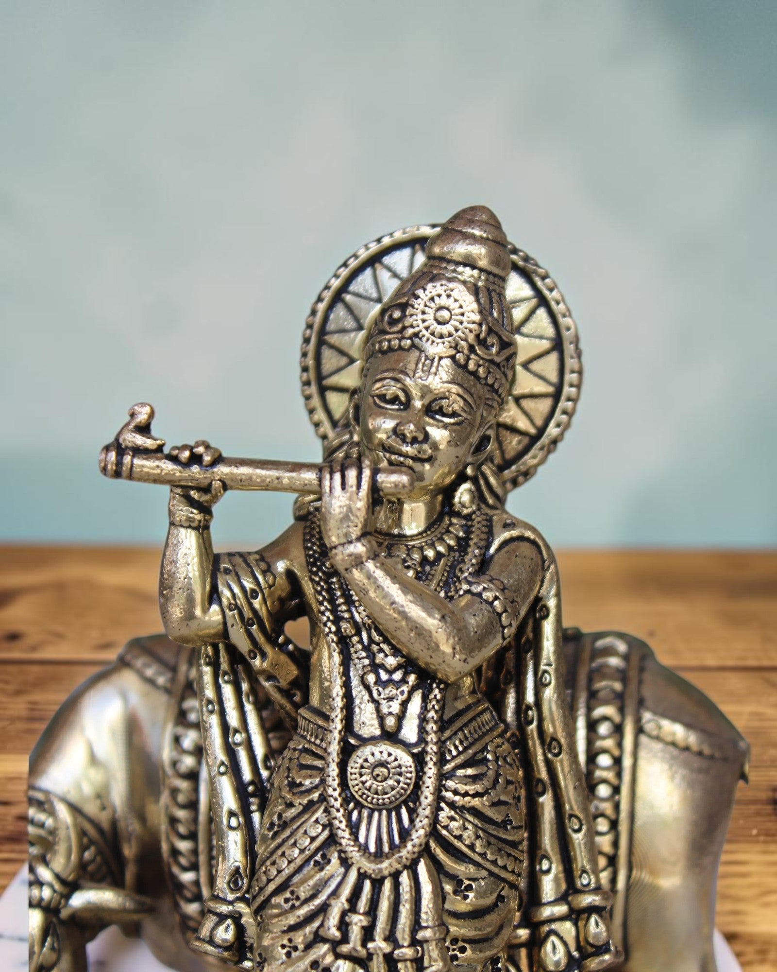 Rigvedaa™ Brass Lord Krishna playing flute with cow statue, 5 inch, golden patina, intricate details.